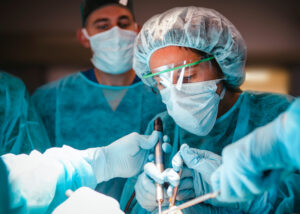Oral and Maxillofacial surgery resident in training during a surgical simulation training lab