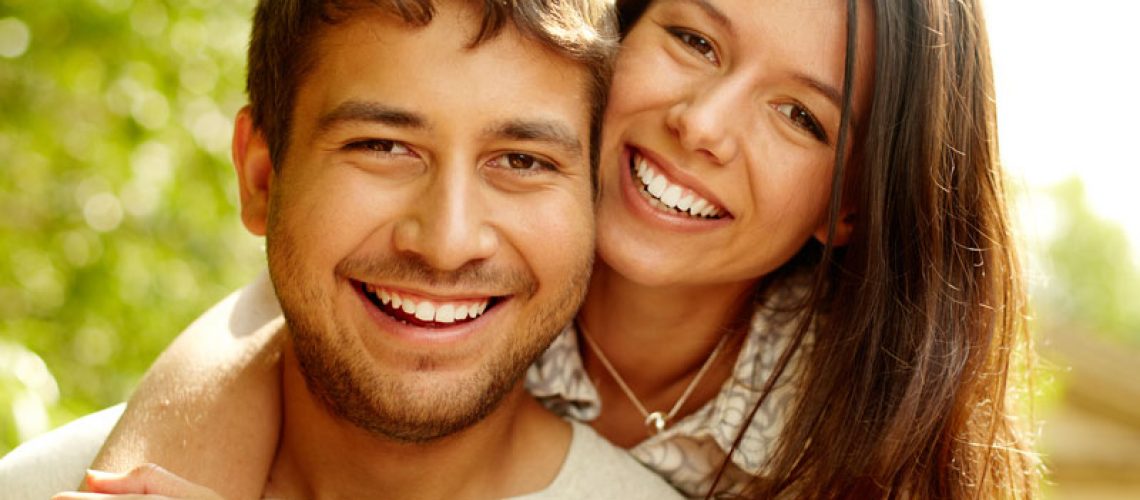 Dental Patients Smiling With Well Cared For Dental Implants In Mt. Pleasant, PA